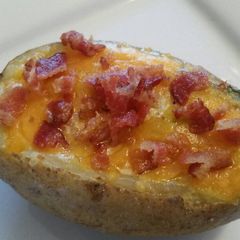 A picture of Potato Baked Eggs & Bacon.