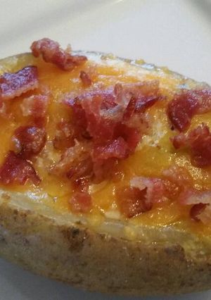 A picture of Potato Baked Eggs & Bacon.