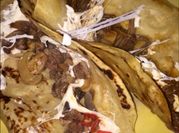 Una foto de quesillo y pollo