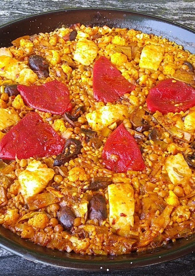 Una foto de Paella de bacalao y coliflores