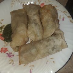 A picture of Chicken puri paratha roll.