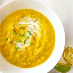A picture of Leek and pumpkin soup with lime.