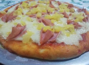 Una foto de Pizza hawaiana
