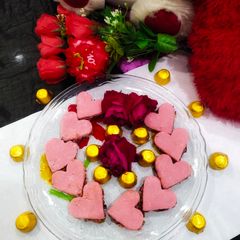 A picture of Rose cashew stuffed burfi.