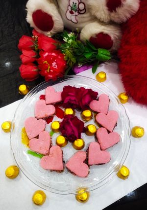 A picture of Rose cashew stuffed burfi.
