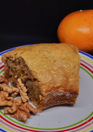 Una foto de Torta de miel, mandarina y nueces 🍊
