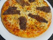 Una foto de lomo pizza