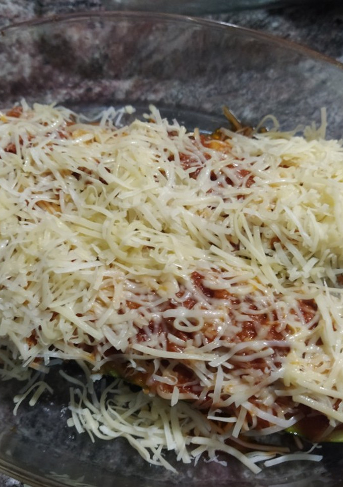 Una foto de Calabacín relleno al horno con cebolla caramelizada