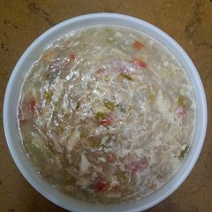 A picture of Chicken corn soup.