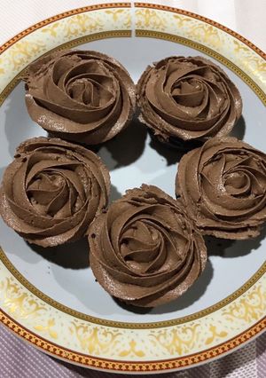 A picture of Dark Chocolate Cupcakes with Chocolate Cream Cheese Frosting.