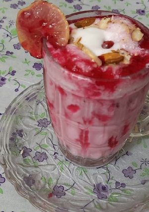 A picture of Strawberry crushed milk shake with vanilla ice cream.