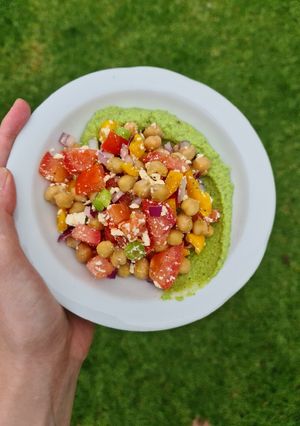 A picture of Chickpea salad with pea pesto.