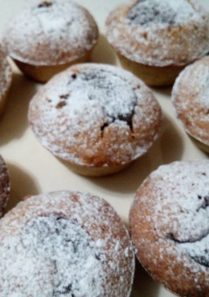 Una foto de Muffins de banana y naranja con corazón de dulce de leche