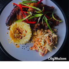 Orange-Spring Onions-Chilli Rice with Sticky Spicy Pork Ribs And Homemade Coleslaw A picture of Orange-Spring Onions-Chilli Rice with Sticky Spicy Pork Ribs And Homemade Coleslaw.