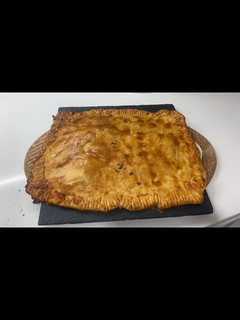 Una foto de Empanada de dátiles y bacon