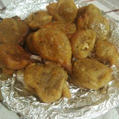 A picture of Mithe gulgule dry-fruit wale.