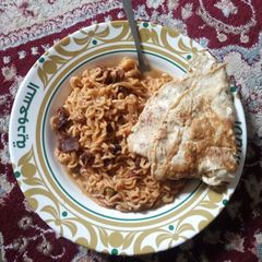 A picture of Indomie and egg.