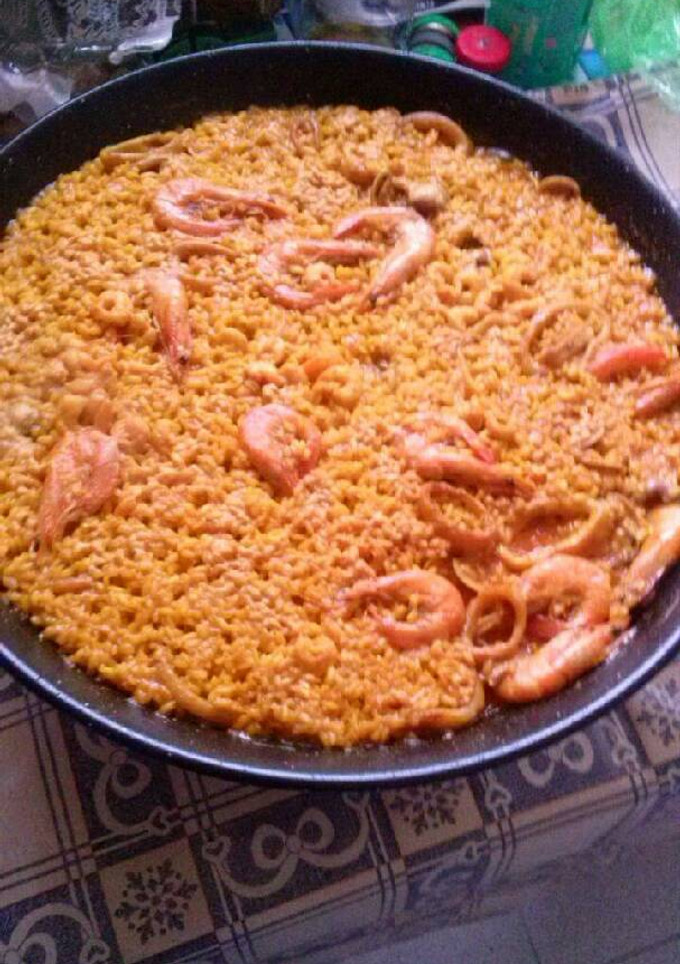Una foto de Arroz a banda