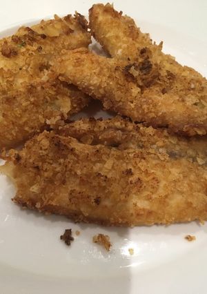 Una foto de Tilapia rebosada con papita