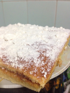 Una foto de Torta de naranja con dulce de leche