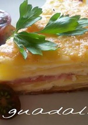 Foto principal de Pastel de patatas con beicon y queso en ollas gm y tradicional