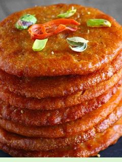 பச்சரிசி மாவில் செய்த அதிரசம்(athirasam recipe in tamil) செய்முறை முக்கிய புகைப்படம்