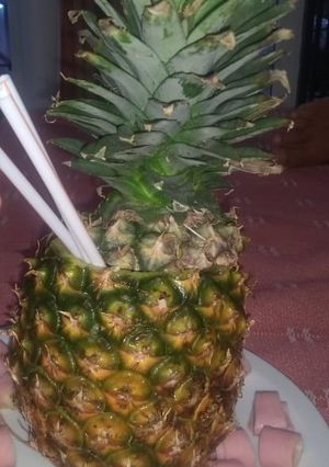 Una foto de Trago con piña
