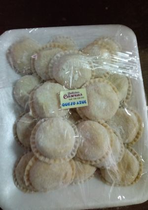 Una foto de Sorrentinos de queso azul