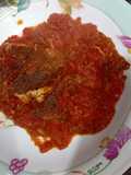 Red tomatoes chutney with fish