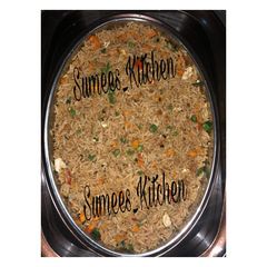 A picture of Brownish Jollop Rice.
