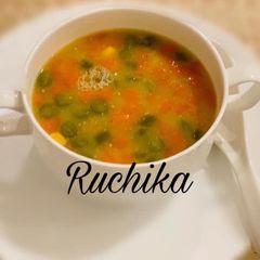 A picture of Sweet Corn Vegetable soup.