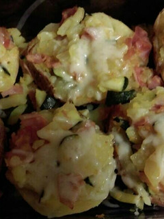 Una foto de Patatas gratinadas rellenas de verdura
