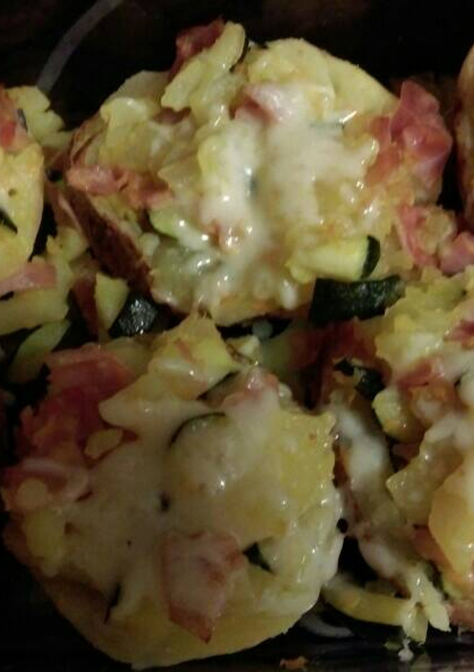 Una foto de Patatas gratinadas rellenas de verdura