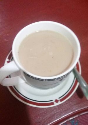 A picture of White coffee with Masala.