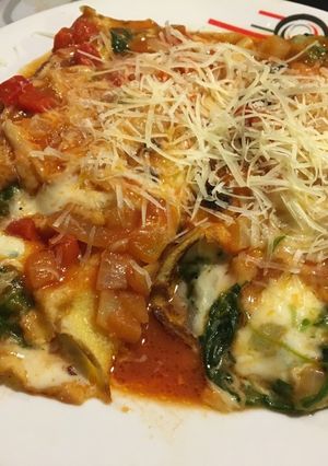 Una foto de Canelones de espinaca y queso!