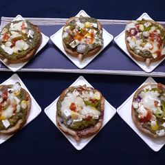 A picture of Garlic Bread Pizza with Sarso Saag.