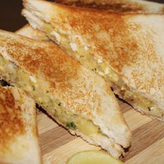 A picture of Egg Masala Sandwich: Spiced and Satisfying.