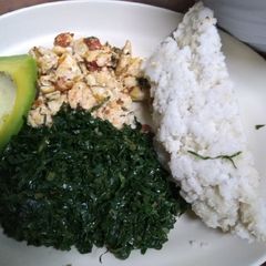A picture of Scrambled eggs +Sauteed kales.