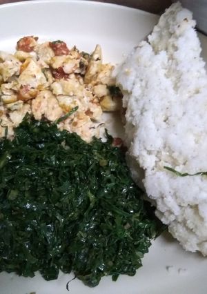 A picture of Scrambled eggs +Sauteed kales.