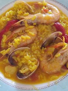 Una foto de Arroz caldoso con cazuela a presión