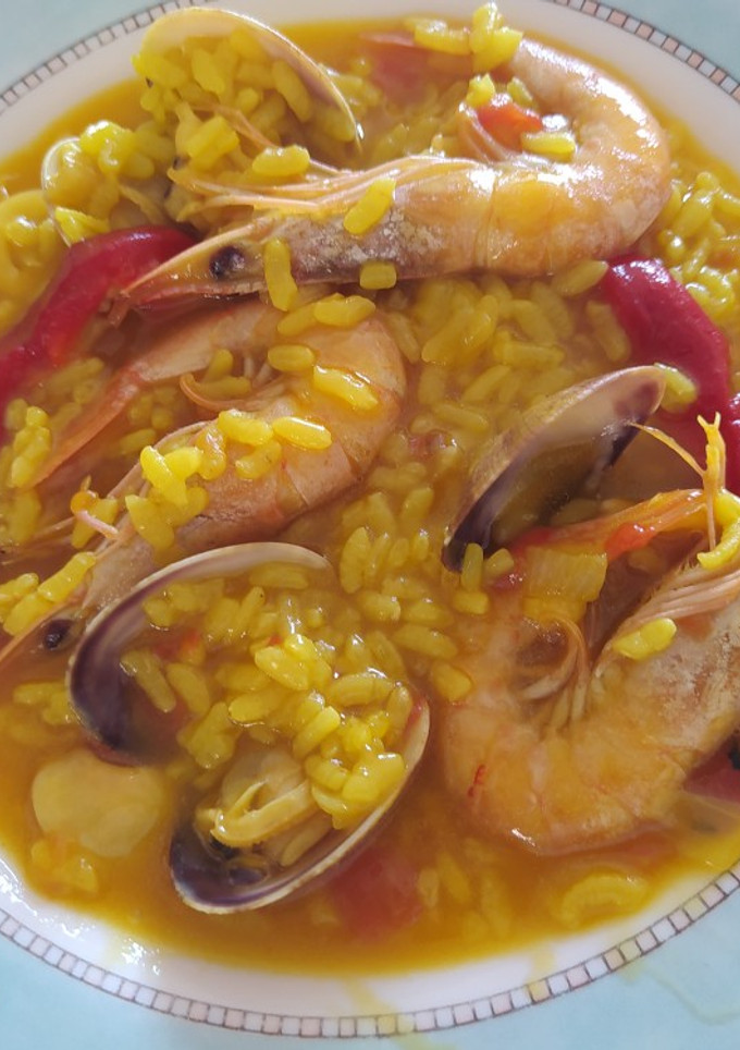 Una foto de Arroz caldoso con cazuela a presión