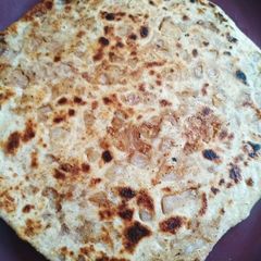 A picture of Onion paratha.
