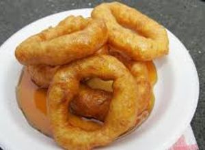 Una foto de Picarones exquisitos y fáciles de hacer con muy pocas cosas