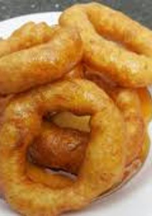 Una foto de Picarones exquisitos y fáciles de hacer con muy pocas cosas