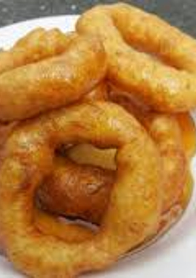 Una foto de Picarones exquisitos y fáciles de hacer con muy pocas cosas