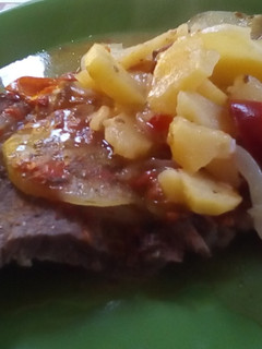 Una foto de Bifes a la criolla