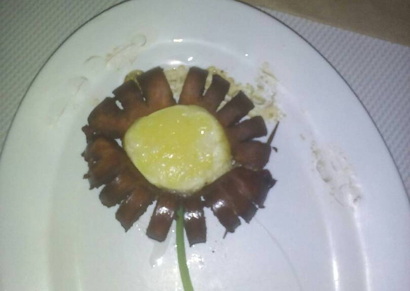 Fried sausage with an egg