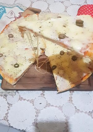Una foto de Pizza Casera de Muzzarella