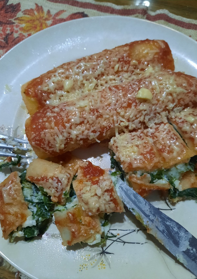 Una foto de Canelones de acelga y ricota con masa