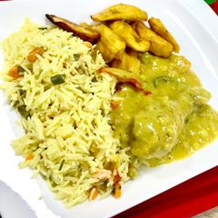 Basmatic rice with curry sauce and fried plantain A picture of Basmatic rice with curry sauce and fried plantain.